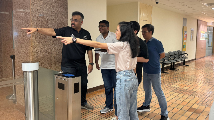 Backroom ops team in discussion with partners
